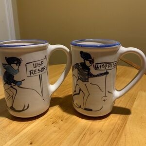 Two pottery Wisp Resort Coffee Mugs